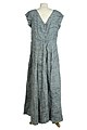 Grey pleated dress designed by Sybil Connolly.