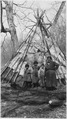 Indian woman and children in front of teepee - NARA - 285766.tif