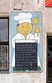 Čeština: Vývěska u restaurace na ulici T. G. Masaryka v Kostelci nad Labem English: Wall-poster by a restaurant in Kostelec nad Labem, Czech Republic