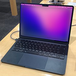 MacBook Air on a table, in a computer store