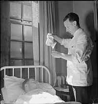 A nurse at Runwell Hospital, Wickford, Essex, in 1943 Male Nurses- Life at Runwell Hospital, Wickford, Essex, 1943 D14313.jpg