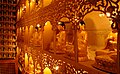 Manbul Treasures' Shrine (hall) enshrines the Buddhist Trinity and 17,000 jade statues around inner wall inside a labyrinth in the back of the shrine. Manbulsa (Ten Thousand Buddhas Temple), in the Manbul Mountains, is a Buddhist Temple that has considerably more than Ten Thousand Buddhas represented throughout this new sprawling temple complex.