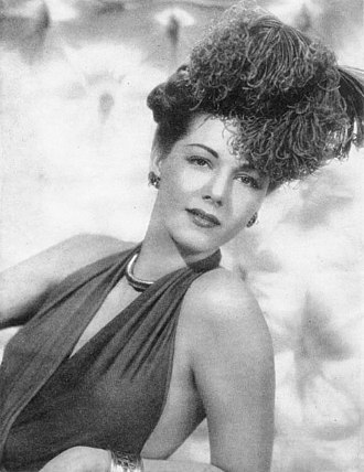 A shrine to Smith's muse Maria Montez appears in the film. Maria Montez Argentinean Magazine AD cropped.jpg