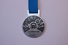 Medallie 45. GutsMuths-Rennsteiglauf Halbmarathon 2017.jpg