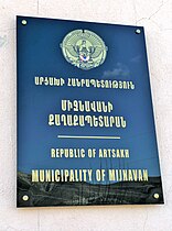 Armenian sign reading "Mijnavan" during its occupation