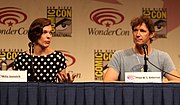 Jovovich with Paul W. S. Anderson speaking at Wondercon 2012 in Anaheim, California (17 March 2012)