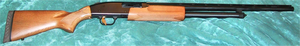 Mossberg 500 Bantam, with 24-inch (610 mm) barrel. Note shorter stock and forend than standard model at top. Mossberg 500 Bantam.png