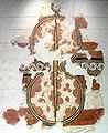 لوحة حائط تصور درعًا ثُماني الشكل من الحضارة الميسينية مع حزام تعليق في المنتصف استخدمه الميسينيون في القرن الخامس عشر قبل الميلاد، المتحف القومي للآثار، أثينا - وجه الدرع ثُماني الشكل كان محدبًا تمامًا. الحزام المشار إليه ربما يكون النتوء البارز في مقدمة الدرع (يرمز إليه بواسطة الزخرفة المرئية على جلد الثور).