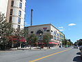 Modells and Applebees in New Roc City as seen from southbound LeCount Place