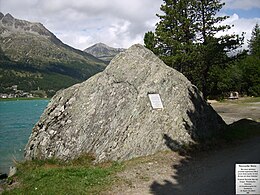 Nietzsche wrote that the concept of eternal return first occurred to him at Lake Silvaplana in Switzerland, "beside a huge rock that towered aloft like a pyramid". Nietzsche-Stein 01.jpg