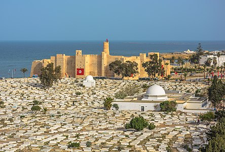 View of the Ribat of Monastir, in Tunisia. This medieval fortress, built in the end of the 8th century AD, is consedred as one of the oldest and biggest Ribats in North Africa. In this picture there is tow other classified monuments in Monastir and they are The Imam Mazri Mausoleum and The Amor Makhlouf Mausoleum too.