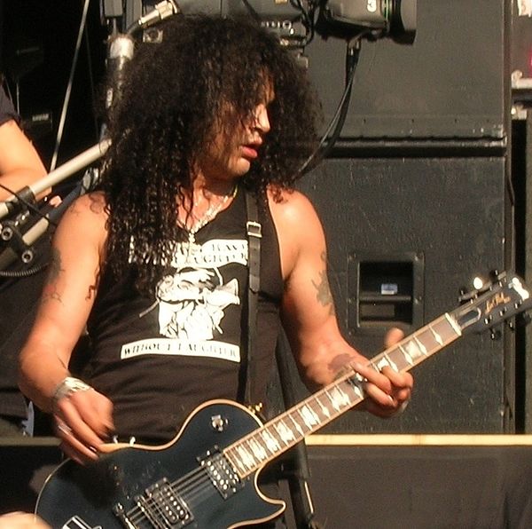 Guitarist Slash performing at a concert in Nijmegen