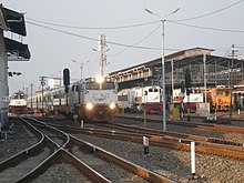The emplacement of the station with the Argo Mulia train passing through, 2017 Semarang Poncol in Busy.jpg