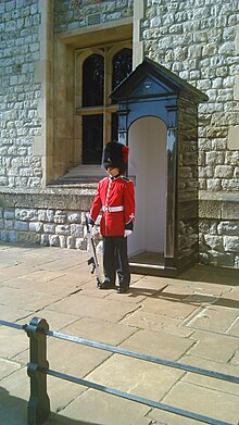 A sentry from the Royal 22 Regiment at his post at the Tower of London, 2014 Soldier from Royal Canadian Regiment guarding the Crown Jewels at the Tower of London in 2014.jpg