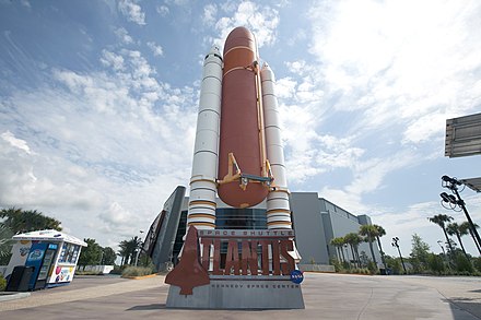 A Space Shuttle stack in front of the Space Shuttle Atlantis Exhibit building