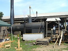 Wood-fired boiler of the steam-powered sawmill at Antique Powerland SteamPoweredSawmill.JPG