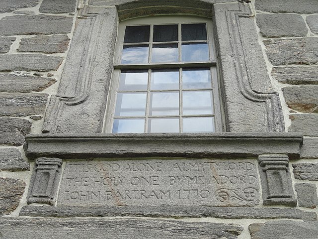 Stone carving by John Bartram dated 1770 on the east-facing side of the Bartram House