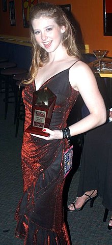 Sunny Lane holding her Best New Starlet trophy at the 2005 NightMoves Awards Show Sunny Lane Tampa 2005.JPG