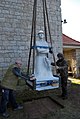 erection of the sculpture in front of the church