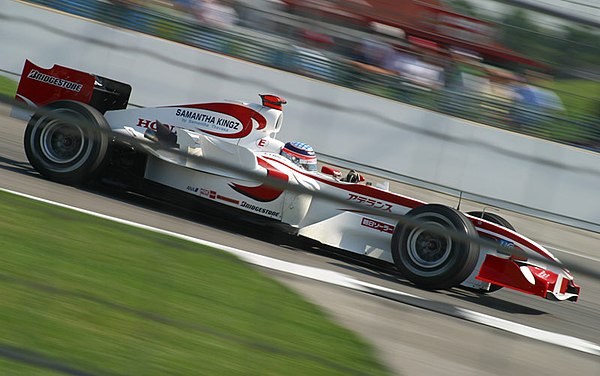 Takuma Sato driving for Super Aguri at the 2006 United States Grand Prix