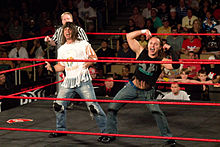 The Young Bucks posing before their match at Showdown in the Sun The Young Bucks Taunt 2012.jpg