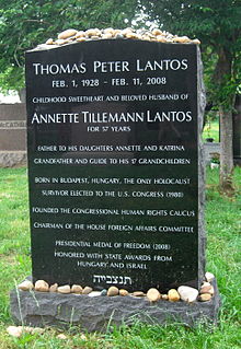 Lantos's grave in Congressional Cemetery, Washington, D.C. The letters at the bottom are a Hebrew acronym for May his soul be bound up in the bond of eternal life. Tom Lantos grave, Congressional Cemetery, Washington, D.C..JPG