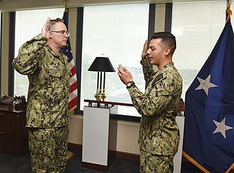 Vice Adm. Timothy White, commander, U.S. Fleet Cyber Command/U.S. 10th Fleet is sworn in during a promotion ceremony held at FCC/C10F headquarters, June 18, 2018.