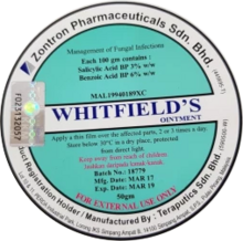 Circular design with green/turquoise and white backgrounds. The text 'Whitfield's ointment' in the centre and other text about ingredients and instructions placed in the green sections.