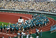 The Australian Team at the 1989 Kobe, Japan FESPIC Opening Ceremony. XX0989 - Kobe FESPIC Athlete Parade Moving Away - Scan.jpg