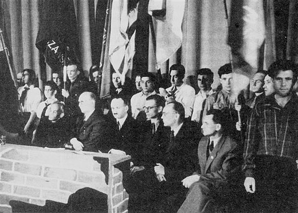 The third anniversary of the Warsaw Ghetto Uprising, the official gathering at the Polish Theatre in Warsaw, April 1946. On stage, among others, the a