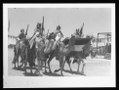 'Coronation' of King Abdullah in Amman. Colour party 'Lowering the Colors' when passing saluting base before the king. Corps Elite LOC matpc.14992.tif