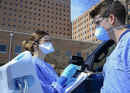 Patients are screened for COVID-19 outside Naval Medical Center Portsmouth, the Navy's oldest continuously operating hospital.[350]