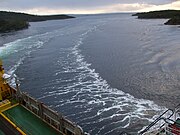 MV Evangelistas passes English Narrows early in the morning, in journey from Puerto Natales to its destination, Puerto Montt.