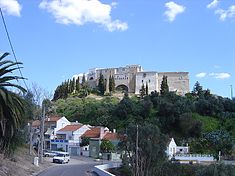 Qaşr Abī Dānis or Al Qaşr (English: The Castle), surmounting the town, was a Moorish citadel before the Reconquista