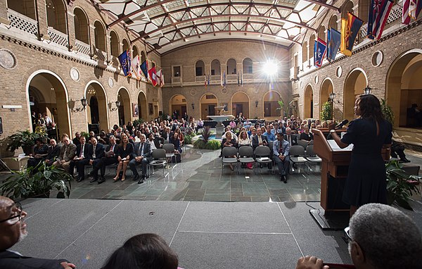 Office of Small and Disadvantaged Business Utilization Deputy Director, Michelle E. Warren, leading an awards ceremony in Washington, D.C.