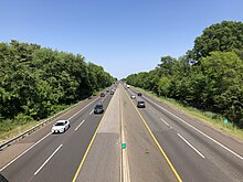 The northbound New Jersey Turnpike in Barrington 2021-05-21 15 45 46 View north along New Jersey State Route 700 (New Jersey Turnpike) from the overpass for New Jersey State Route 41 and Camden County Route 573 (Clements Bridge Road) in Barrington, Camden County, New Jersey.jpg