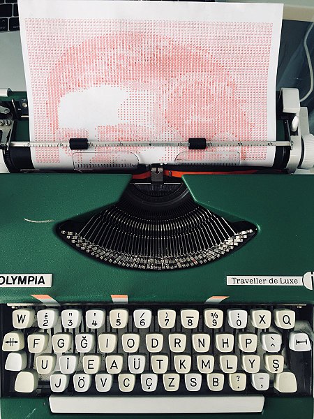 File:A typewriter mystery game in the process of being typed in.jpg