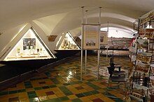 Inside, the museum has exhibitions in showcases, as well as a reconstruction of a medieval Haarlem cesspit dig. Archeologisch Museum Haarlem-inside.jpg