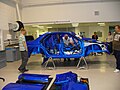A racecar bodyshell with integrated roll cage