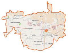 Mapa konturowa gminy Błonie, blisko centrum na prawo znajduje się punkt z opisem „Błonie”