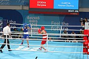 Deutsch: Boxen bei den Olympischen Jugendspielen 2018 Tag 12, 18. Oktober 2018 - Kampf um die Bronzemedaille im Fliegengewicht Mädchen – Heaven Destiny Garcia (USA, blau) schlägt Goryanana Stoeva (Bulgarien, rot) 5-0; Ringrichter ist Ishanguly Meretnyyazov (Turkmenistan). English: Boxing at the 2018 Summer Youth Olympics on 18 October 2018 – Girl's flyweight Bronze Medal Bout - Heaven Destiny Garcia (USA, blue) beats Goryanana Stoeva (Bulgaria, red) 5-0; Referee is Ishanguly Meretnyyazov (Turkmenistan). Español: Boxeo en los Juegos Olímpicos Juveniles de Verano de 2018 en 18 de octubre de 2018 - Combate a medalla de bronce de peso mosca para mujeres: Heaven Destiny Garcia (Estados Unidos, azul) le gana a Goryanana Stoeva (Bulgaria, roja) 5-0; El árbitro es Ishanguly Meretnyyazov (Turkmenistán).