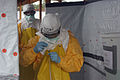 CDC Director exiting Ebola treatment unit.jpg