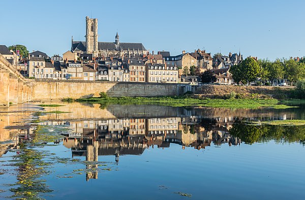 A view of the prefecture of the Nièvre department, the city of Nevers, on the river Loire, with Nevers Cathedral in the background