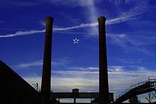 The Lindale Mill smokestacks with a Christmas star hanging between them. Christmas star at the old Lindale Mill.jpg