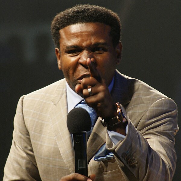 Clemons speaking at We Day Waterloo 2010, a Free the Children event