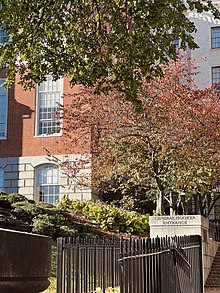 Cornerstone containing time capsule at Massachusetts State House exterior in fall, 2022.jpg