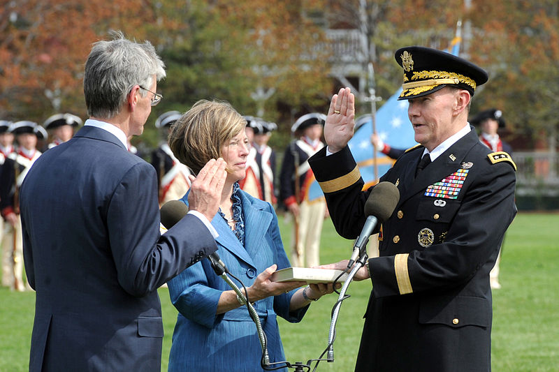 File:Defense.gov News Photo 110411-D-XH843-005 - Secretary of the Army John M. McHugh left delivers the oath of office to Gen. Martin E. Dempsey right while his wife Deanie 2nd from left looks on.jpg