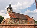 de: Feldsteinkirche, wahrscheinlich aus dem 14./15. Jahrhundert. Kirchturm um 1700.