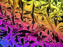 Liquid crystal as visualised by a polarizing microscope. Germany is a pioneer research centre for nanotechnology and materials engineering. Fachertextur.jpg