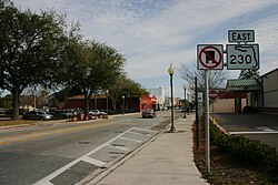 First SR 230 sign on Call Street east of US 301 with a "No Trucks" symbol sign. FLoating 230 (28414515494).jpg